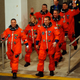 NASA officials celebrate after finally locating and murdering the Supreme Being.